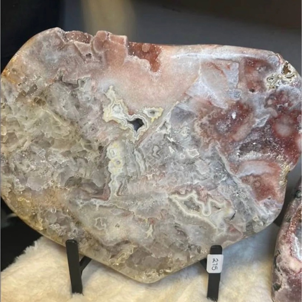 Pink amethyst slab on stand